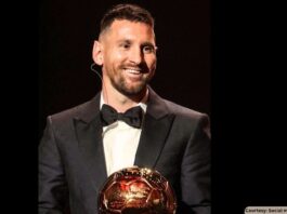 Messi carrying a ballondor