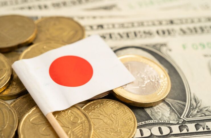 BOJ Rate Hike: Japan Raises Rates to 31-Year High, Shaking Global Markets Japan flag with cons and dollar bills